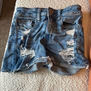 American Eagle Outfitters Blue Distressed Next Level Stretch Jean Shorts